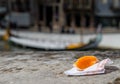 Portuguese delicacy called Ovos Moles made of egg yolks and sugar on the water channel background in Aveiro city