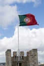 Portuguese flag at Castelo de Sao Jorge (Portugal) Royalty Free Stock Photo