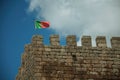 Portuguese flag fluttering on top of tower from Castle Royalty Free Stock Photo