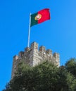 Portuguese flag on a tower of St George`s Castle in Lisbon Royalty Free Stock Photo