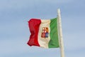 Portuguese flag waving dusted with sand in strong vind Royalty Free Stock Photo