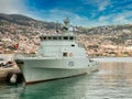 Portuguese Navy Tejo-class coastal patrol vessel Douro P591 moored at  port in Funchal, Madeira, taken on a calm, cloudy day. Royalty Free Stock Photo