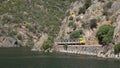 Portuguese railway known as Linha do Douro traveling alongside the river Douro in Portugal