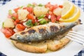 Portuguese style grilled sardines with salad