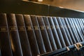 Porvoo, Finland - 2 October 2019: Closeup of a row of green hymn books on finnish language in Porvoo Cathedral