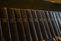 Porvoo, Finland - 2 October 2019: Closeup of a row of green hymn books on finnish language in Porvoo Cathedral