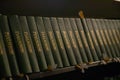 Porvoo, Finland - 2 October 2019: Closeup of a row of green hymn books on swedish language in Porvoo Cathedral