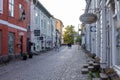 Shops and boutiques by a paved street in the old town of Porvoo, Finland