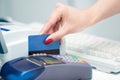 POS Terminal Transaction. Hand Swiping a Credit Card. Royalty Free Stock Photo