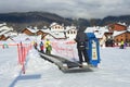Posa Khutor, Sochi, Russia, January, 26, 2018. Children`s tape lift on training ski slope on ski resort Rosa Khutor