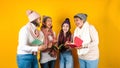 Posada Mexicana, Mexican family Singing carols at Christmas, three generations of women in Mexico Latin America