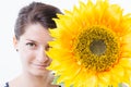 Pose behind a sunflower Royalty Free Stock Photo
