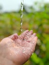 Pose of receiving water with hands,30,Apr,2025 Royalty Free Stock Photo
