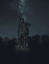 Poseidon or Neptune statue in botanical garden Nymphenburg in Munich, Germany Royalty Free Stock Photo