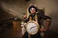 Poser in Large Hat and Clock Royalty Free Stock Photo