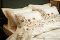 posh embroidered bedding set in a boutique hotel room