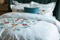 posh embroidered bedding set in a boutique hotel room Royalty Free Stock Photo