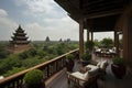 posh hotel, with view of majestic pagoda on the horizon