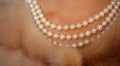 Posh posh. Classic retro style design. Pearl necklace and mink fur. Natural pearl beads and fur. Fashion accessory and Royalty Free Stock Photo