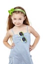 Posing little girl in striped blue sundress