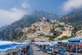 Positano, Italy - August 12, 2019: People enjoy summer beach time at Positano in Amalfi Coast