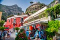 Positano, Italy - June 29, 2021: Tourists along the city colorful streets in summer season Royalty Free Stock Photo