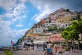 People in Positano beach on a cloudy day