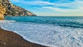 Positano - Scenic view at the Fornillo Beach in the coastal town Positano at Amalfi Coast, Italy. Praiano in distance Royalty Free Stock Photo