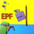 Position the calculator, pencil and note paper wording Saving with love clamps and also a written EPF on background.