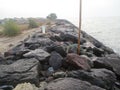 The position of the seafront stone pair to withstand the beach waves Royalty Free Stock Photo