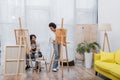 Positive african american couple looking at