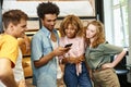 positive african american man with mobile