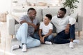 Positive African American Multi-Generational Male Family Resting At Home Together Royalty Free Stock Photo