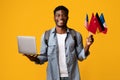 Positive african american young man learning foreign languages online Royalty Free Stock Photo