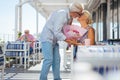 Positive aged man giving a kiss to his wife