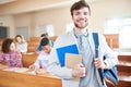 Positive ambitious guy in classroom