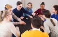 Classmates having round of Werewolf game at break between classes Royalty Free Stock Photo