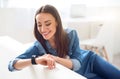 Positive attractive woman resting on the couch Royalty Free Stock Photo