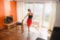 Positive ballet dancer practice exercises at home Royalty Free Stock Photo