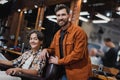 Positive bearded barber smiling at camera Royalty Free Stock Photo