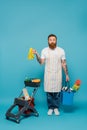 positive bearded man with rubber gloves