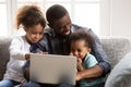 Positive black African family together at home Royalty Free Stock Photo