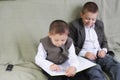 Positive brothers reading book Royalty Free Stock Photo