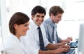 Positive business people working at computers Royalty Free Stock Photo