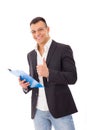 Positive businessman with notes and pen