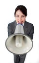 Positive businesswoman using a megaphone Royalty Free Stock Photo