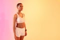Positive calm slim sweat millennial woman lady athlete in sportswear look at copy space