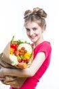 Positive Caucasian Girl Posing With Eco Shopping Bag Filled With Vegetables Isolated Over White