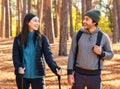 Positive couple in love hiking together by forest Royalty Free Stock Photo