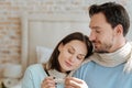 Positive couple sitting at home Royalty Free Stock Photo